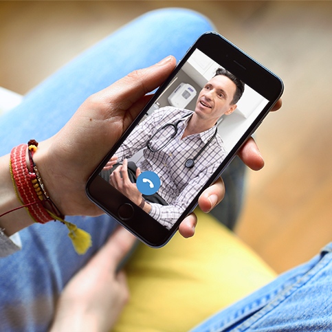 Patient talking to an online doctor on video chat.