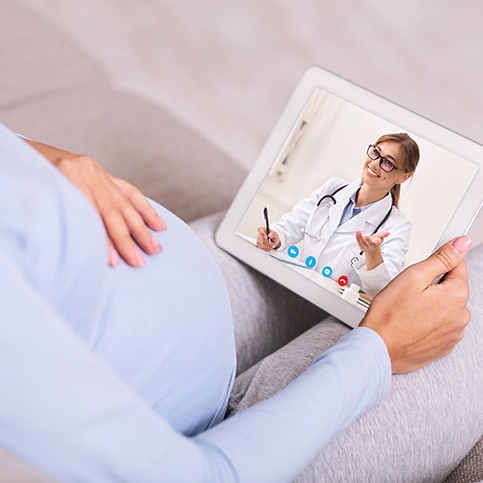 woman speaking to online gynecologist